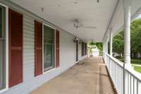 The porch has hooks ready for you to pick out your perfect porch swing!