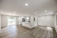 Open concept with living, dining and kitchen