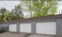Separate garage building with 3 bays and separate room