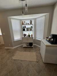 Breakfast nook overlooking backyard.
