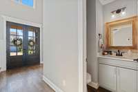 Off the living room is a half bathroom perfect when hosting guests or entertaining.