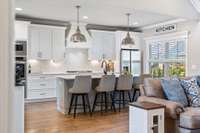 A chef’s paradise! This modern white kitchen blends style and function effortlessly.