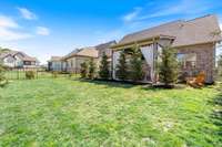 Enjoy privacy trees and a fenced in yard.