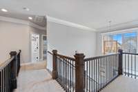 Upstairs, you'll find two bedrooms separated by the catwalk.