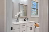 Plenty of space for two with dual vanities in the primary bathroom