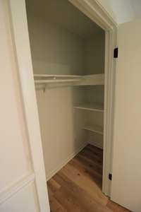 Custom shelving built into 2 of the bedroom closets.