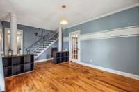 Another view of the Formal Dining Room that leads into the Kitchen and features Built-ins