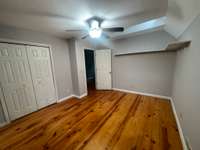 Bedroom 3 located upstairs with beautiful skylights to let in the natural light