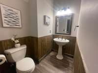 Freshly Painted Half Bath located on the Lower Level