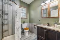 Full Bath located off the Laundry room and garage