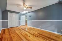 Bedroom 2 located on the upper level featuring gorgeous skylights to let in all the natural light