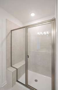 ***Photo from another townhouse recently completed in community with same finishes***

We have also added a tile shower with a bench in the Owner's Bathroom as well.