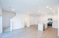 ***Photo from another townhouse recently completed in community with same finishes***

The open-concept layout of the 1st floor is perfect for entertaining family and friends.
