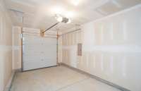 ***Photo from another townhouse recently completed in community with same finishes***

A 1-car Garage is included in addition to a driveway parking spot.