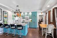 eat - in kitchen with bar. All appliances stay.