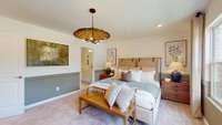 ***This photo was taken from the Grisham model home in Adams Preserve***  The Owner's Bedroom measures 18' x 13', providing plenty of space to relax.
