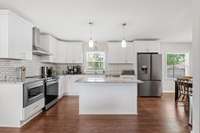 Kitchen has had new cabinets, granite tops and appliances replaced.  Entire house has been remodeled.
