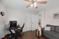 one of the secondary bedrooms currently being used as a den.