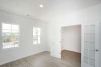 ***Photo is from a previously completed Hampton home in the community***  The 1st floor Study is ideal for those needing a dedicated workspace or homework zone. Others have used this as a formal Dining Room for hosting dinner parties.