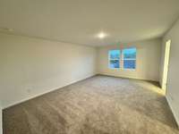 ***Photo taken on 4/10 of actual home for sale***  Owner’s Bedroom