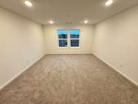 ***Photo taken on 4/10 of actual home for sale***  Loft