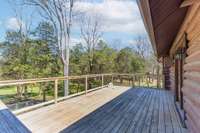 Large deck overlooking private back yard