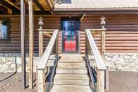 Welcome home to your log cabin nested on 3.14 acres