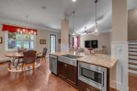 Under mount Stainless Steel Sink, Breakfast Bar and Pendant lighting are a few things you do not want to miss!