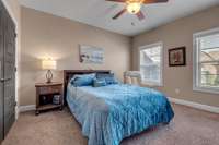 Bedroom 3 features ceiling fan and large closet.