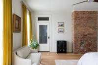 Touches of historic character around every turn in this primary suite.