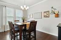 Chic and modern dining room with seamless flow into the kitchen