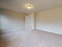 Photo is not of the actual home, but is an inspirational photo of builder’s model home and may depict options, furnishings, and/or decorator features that are not included