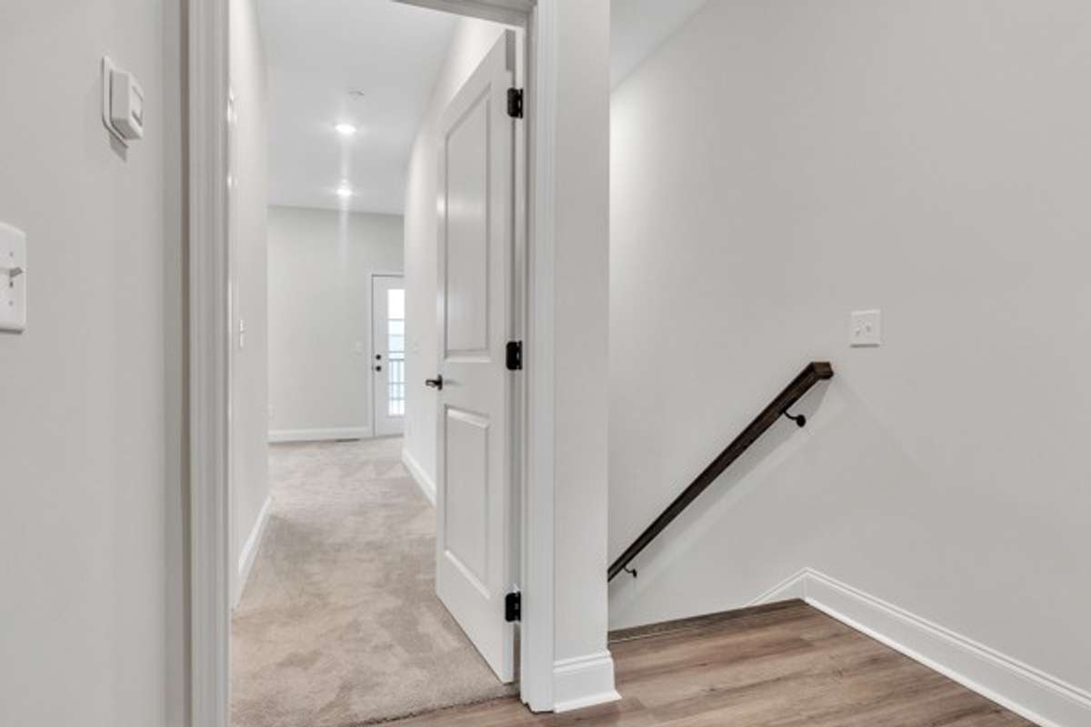 Top of 3rd floor landing where owner's retreat enters toward the front of home.
