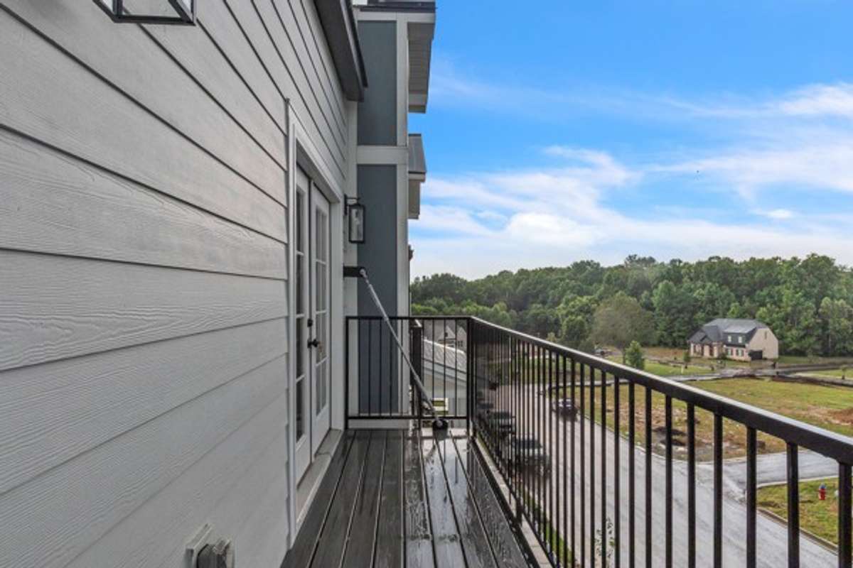 This owner's retreat balcony is the perfect place to start and end the day. It would be extra dreamy with seasonal plants & flowers.