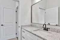 Another look at the elegant granite and modern decor.