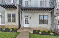 This adorable font porch is just waiting for your seasonal decor!