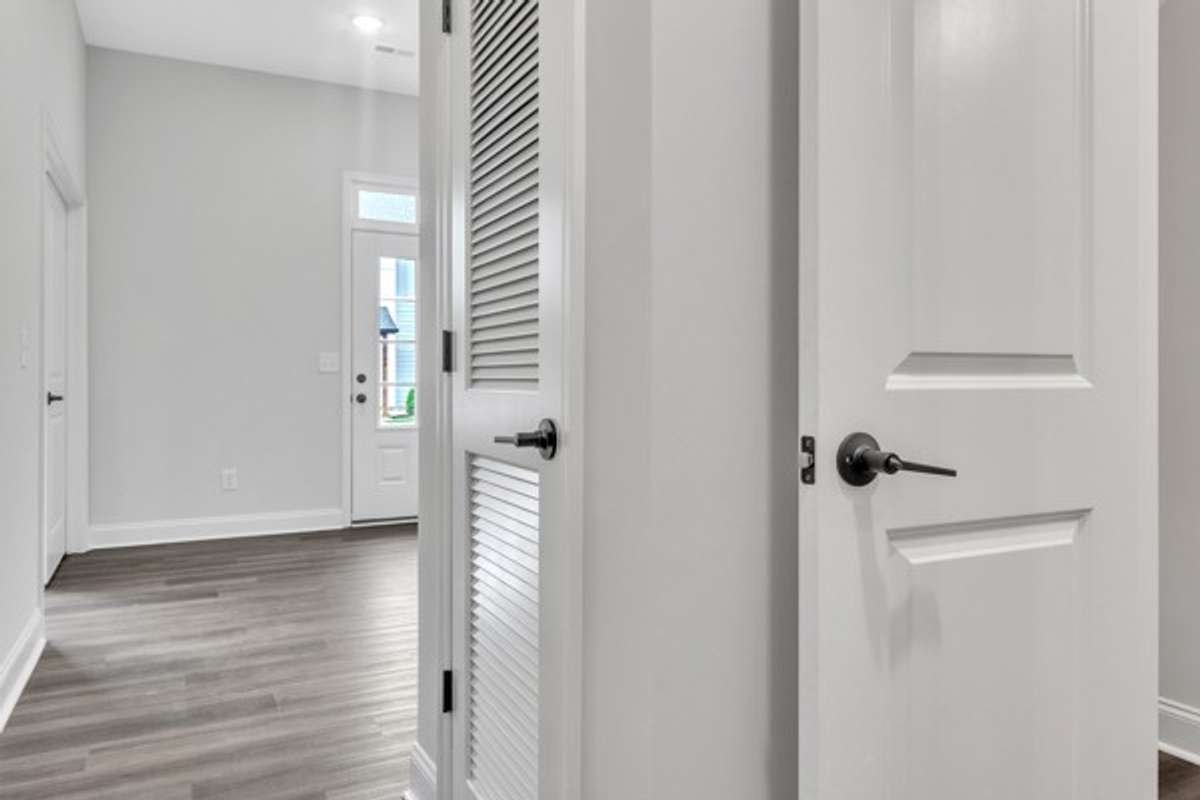 As you enter from the 2 car garage a half bath is on the right and in front of you lies the entry foyer and flex office area to the left of foyer.