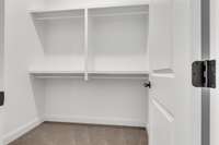 Spacious walk in closet for guest bedroom.
