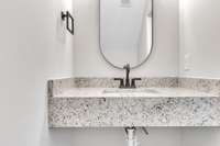 Half bath on 1st floor convenient to garage, office and front door.