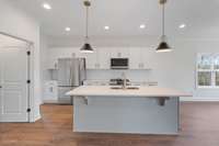 Walk in pantry off the left with built-in shelves