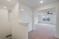 The upstairs layout is very uniquie. It wraps all the way around with 3 bedrooms, 2 full baths, and a bonus rec room!