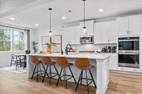 Photos are of the Slatewood Decorated Model Home and are for demonstration purposes only. Colors and finishes will vary.