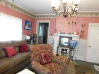 Fireplace may need an electric insert for a cozy effect!