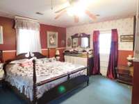 Second Bedroom offers a Full Bath, and a doorway to the Back Yard