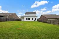 Large fenced backyard offers great privacy and no neighbors behind you!!