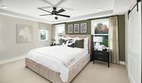 ***Photo taken from previously built Hopewell model home***  The Primary Suite offers a private retreat complete with a tray ceiling, generous walk-in closet and a spa-inspired bathroom!