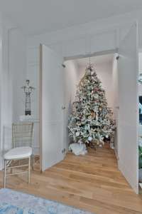 There it is - hidden Christmas Tree Closet in entry - just pull it out and you are ready for the Holidays.