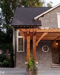 Arbor showcasing round window in Grand Foyer.