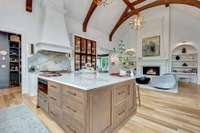 Kitchen and Living Room features a large Walnut island with Quartzite Counter Top.