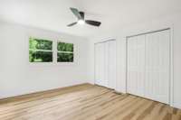 Primary bedroom. Double closets. Remote control ceiling fan/light